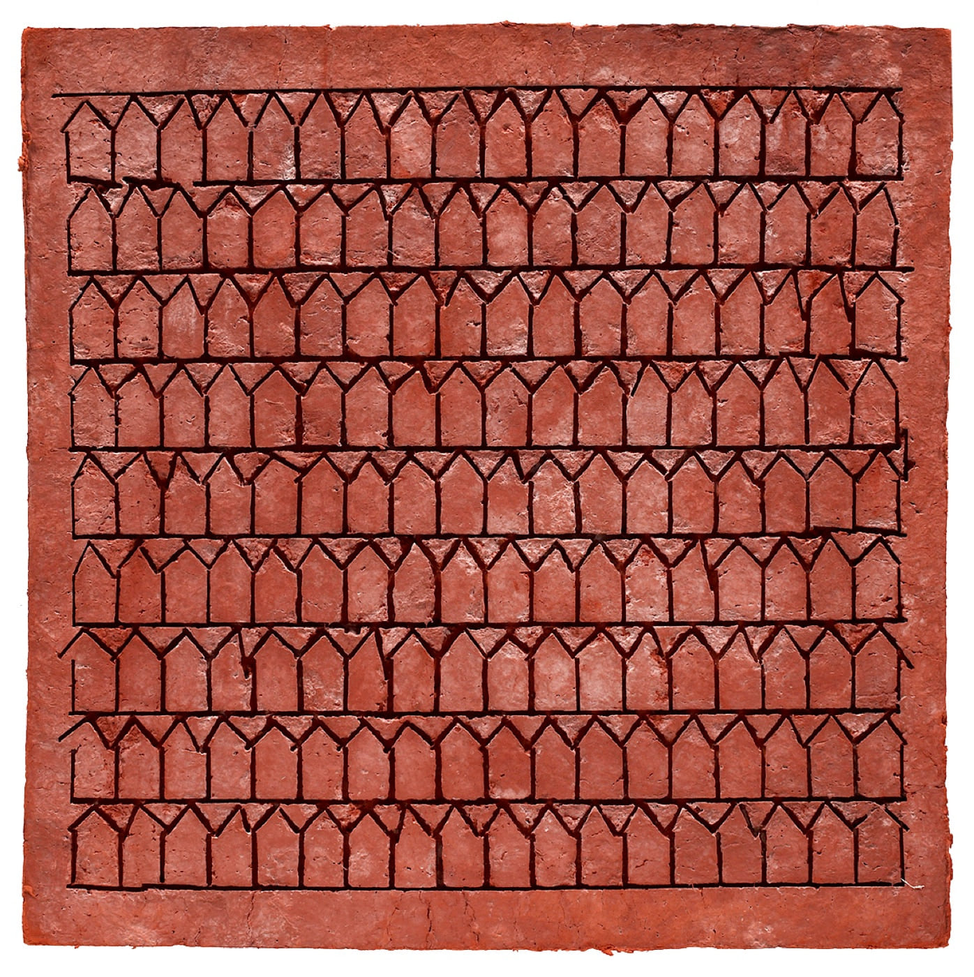 Traces, 1980, a terra-rosa cast-paper relief filled with repeated rows of incised house forms