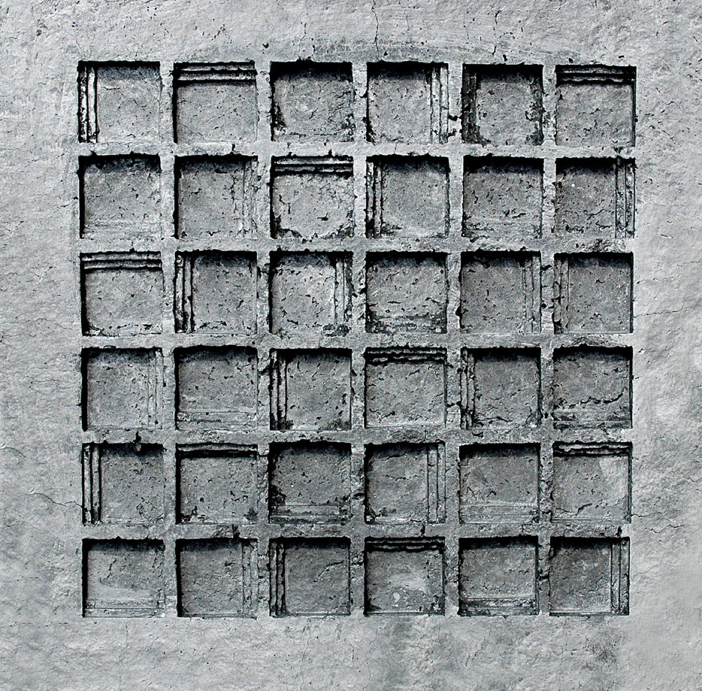 Steps, 1981, a square cast-paper relief with a recessed grid darkened by black pigment and aluminum powder