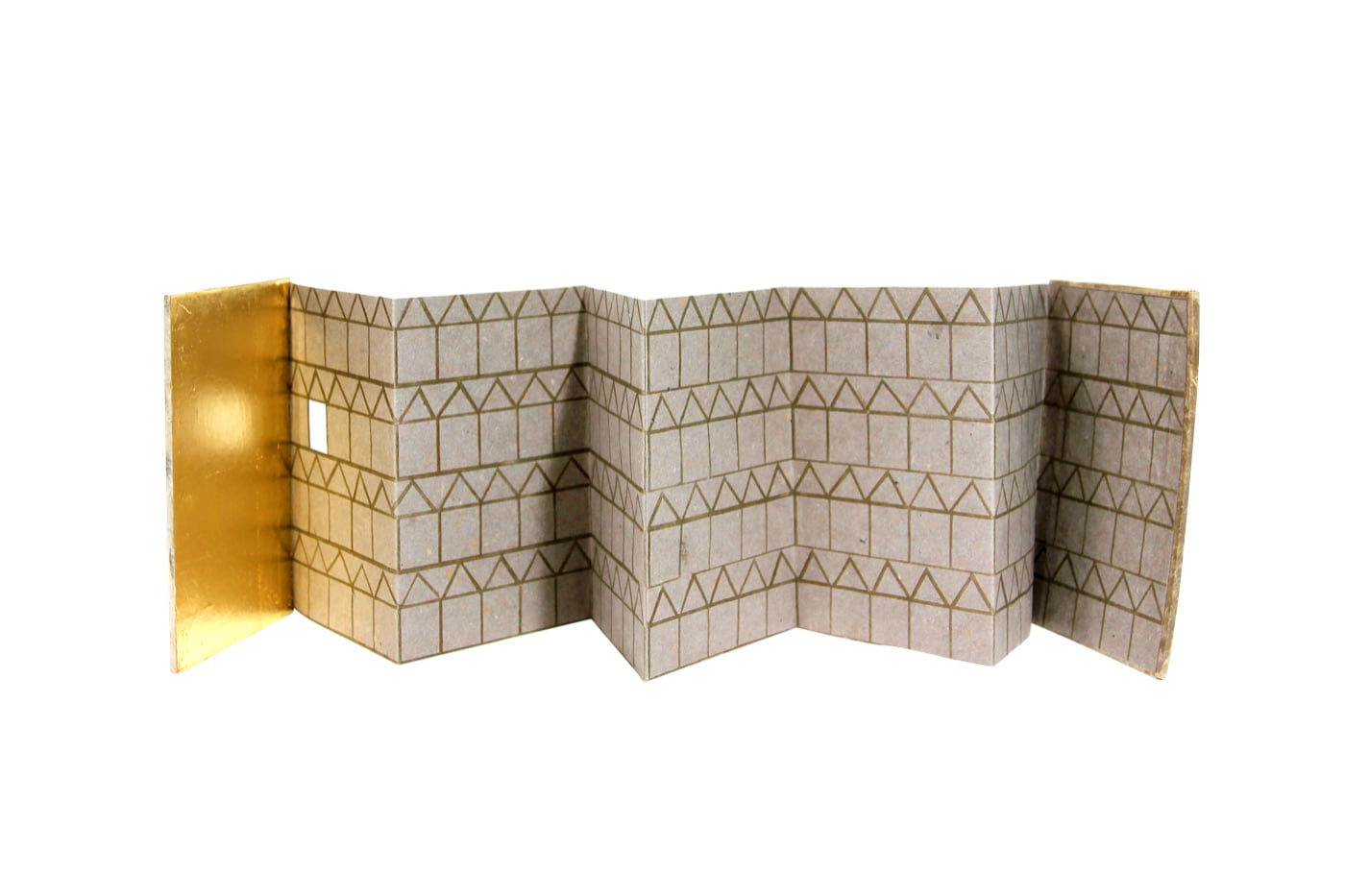 Golden Morning, 2001, an accordion-folded paper structure whose drawn houses open between pale surfaces and gold-leaf ends