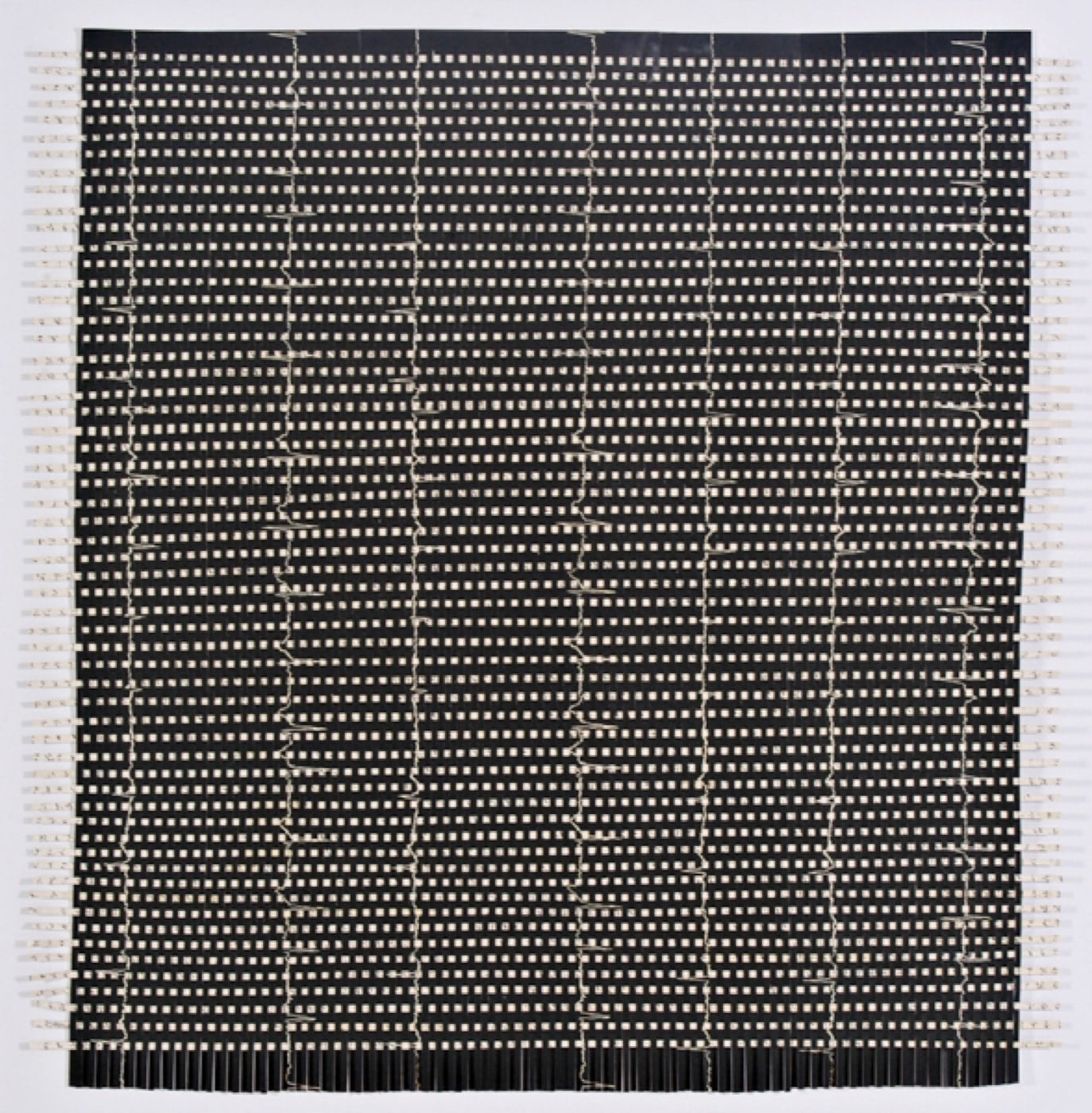 Weaving Memory, 2006, woven strips of woodcut and computer-generated text forming a tightly worked square field