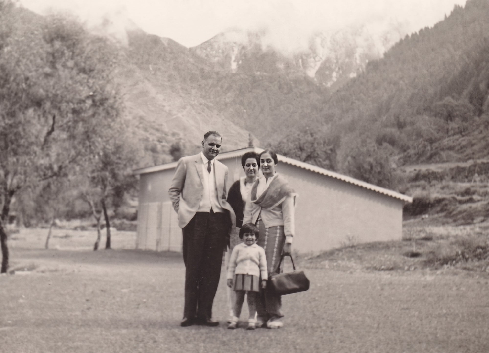 Mashkoor with baby Saima, Rani in front, and Zarina behind